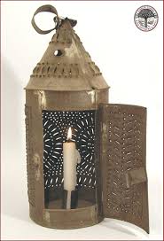 All of our imported metal candle holders are handcrafted by talented tinsmiths in mexico. Lantern Pierced Tin American Antiques