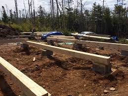 Around the outside perimeter of the foundation, you will need to lay wooden formwork to act as a shutter to hold the concrete in. How To Build A Rock Solid Low Cost Off Grid Cabin Foundation