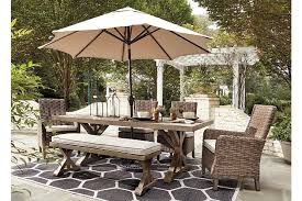 By wellfor (19) 9 ft. Beachcroft Outdoor Dining Table With Umbrella Option Ashley Furniture Homestore