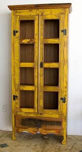 Distressed furniture is often perceived as having a shabby chic style and you can expect to see it in rustic, vintage, industrial but also nordic or contemporary interior decors. 0ea927e8b367deab42dfa1a804b6bd73 Jpg 447 822 Pixels Distressed Furniture Rustic Furniture Yellow Cabinets