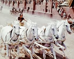 During the race, messala drives a chariot with blades on the hubs to disable his competitors. Charlton Heston In Ben Hur By Silver Screen Chariot Racing Ben Hur Movie Ben Hur 1959