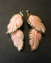 Vintage Lisner Leaf Clip Earrings Collectors Weekly Floral shape and elegant small white pearls feature this lovely jewel. vintage lisner leaf clip earrings