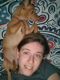 Rescued dog takes care of new puppy