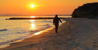 Man Walks On The Beach At Sunset by nspasov | VideoHive