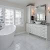 Bathroom natural wood cabinets bathroom assembly with dark marble top and oval white sink (which could be a bit bigger as for my taste). 1