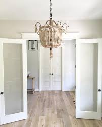 Color In The First Room Is Pale Oak By Benjamin Moore The Color That S Further Away Is Gray Owl Guest Room Office Guest Room Paint White Oak Floors