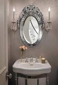 Gray French Powder Room With Oval Venetian Mirror French Bathroom Oval Mirror Bathroom Venetian Mirrors Bathroom Mirror Design