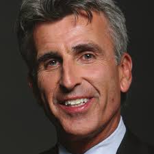 The business school dean redefined