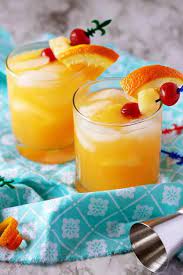 To make it, combine 1 ounce each of light rum, dark rum, and orange curaçao with 1 1/2 ounces each of passion fruit purée or syrup and orange juice, 1/2 ounce each of fresh lemon and lime juices, 1/4 ounce of grenadine, and 2 dashes of aromatic bitters. Rum Mixed Drinks Berly S Kitchen