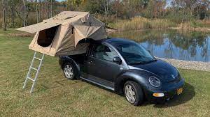 Vw beetles with cartop tent campers. Camping With A Difference With The Vw Beetle Pickup Truck