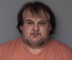 Adel man arrested for allegedly hitting neighbor with baseball bat