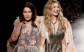 Gigi hadid won't appear in the victoria's secret fashion show. All The Times Gigi And Bella Hadid Walked The Runway Together Footwear News