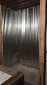 I installed galvanized corrugated metal vertically in my master bathroom shower. C D Contracting Corrugated Metal Shower In A Shipping Facebook