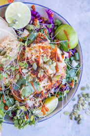 In a small bowl, add the mayo, the juice of 1 lime and 2 tbls chopped cilantro. Baja Fish Taco Bowl With Spicy Halibut Avocado Crema And Red Cabbage Makes For A Fresh And Vibrant Meal Seafood Recipes Fish Taco Bowls Baja Fish Tacos