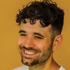 Who produced “Belief” by MC Bravado?