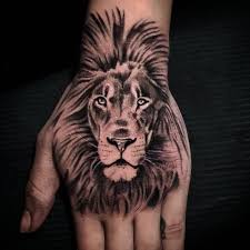 Because these tattoos are realistic, choosing such designs can help tell a story or send an important message to onlookers. Tattoo Uploaded By Jack Carroll Tattoos Hand Tattoo Lion Black And Grey Realistic Blackandgreytattoo Blackandgrey Realistic Realism Realistictattoo Blackandgraytattoos Tattoo Handtattoo Handjob Liontattoo Lion 932972 Tattoodo
