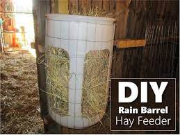 Another easy option for a diy horse hay feeder is to use a corner of a barn that you already have. Diy Rain Barrel Hay Feeder Hay Feeder Sheep Feeders Goat Shelter