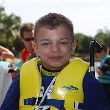 Sick and disadvantaged kids see their dreams come true by swimming with  dolphins