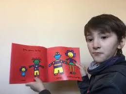John, a fifth grade student in Mrs. Hines' class, reads us "It's Okay to be  Different" by Todd Parr for our Read Across America month read aloud. , Who  will be next? Tag!