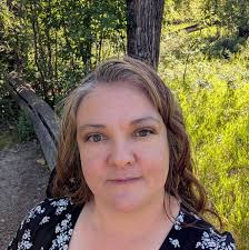 Should I stay in Lethbridge or move to another city in Canada?