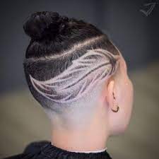 Designs cut into low or faded hair, like those seen on the side of mohawks, are being done at barber shops across the nation. The 50 Coolest Shaved Hairstyles For Women Hair Adviser
