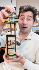 In 1946 Brook Stevens was commissioned to make this lighter, a replica of  the Johnson Wax Research Tower in Racine, WI, which was designed by Frank  Lloyd Wright. It was commissioned to