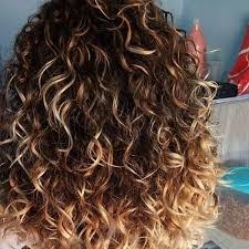 When styling, curl your long tresses away from the face and apply. Scattered Blonde Highlights In Curly Brown Hair Google Search Kivircik Sac Dogal Bukleli Sac Kalin Saclar