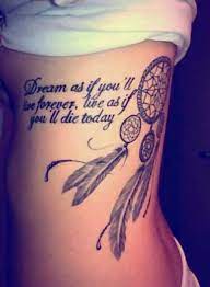 36 Meaningful Dreamcatcher Tattoo Designs Dream Catcher Tattoo Design Rib Tattoo Tattoo Designs
