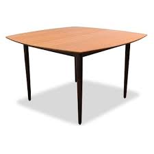 Add a natural element to your home with a teak dining table. Mogens Kold 12 Vintage Design Items