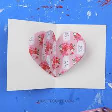 Take one of the folded pieces of paper and keep it folded in half. How To Make A Pop Up Heart Card Craft Rocker