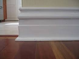 Distressed 3d cutout gather plank. 9 Farmhouse Baseboard Design Ideas For Your Home