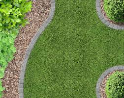 Install clay pavers to form a tidy garden border to separate your lawn from plantings. Edge A Garden How To Edge A Garden Bed With Stone Or Bricks
