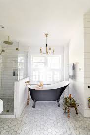 Black and white accent chairs. Modern Black And White Bathroom With Brass Accents Bright Green Door