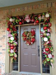 Whimsical Christmas Doorway From Southern And Sassy Door Decor And More On Facebook Diy Christmas Garland Front Door Christmas Decorations Christmas Garland
