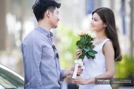 Check spelling or type a new query. Chinese Man Giving Flowers To Girlfriend Asian Ethnicity Selective Focus Stock Photo 183043024