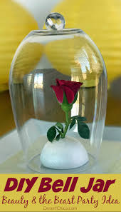 An easy and fun enchanted rose diy, inspired by beauty and the beast! Diy Bell Jar Beauty And The Beast Party Idea Desert Chica