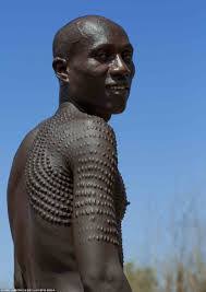 Ethiopian and sudanese tribes show off scar patterns made with thorns. The Story Of Scarification As An Ancient African Tattoo Culture Ibiene Magazine