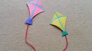 These kites are my favorite ones to make with a large group of kids because many times i invite the kids to decorate the sheet of paper with stickers, crayons, or markers. Make Fun Miniature Paper Kites Diy Guidecentral Youtube