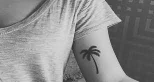 Mixed polynesian maori tribal tattoo coconut leaf ceramic ornament this original tribal polynesian tattoo is mixed with koru maori shapes from the new zealand tribes. 50 Best Palm Tree Tattoo Designs In 2021 For Tree Lovers