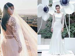 The Most Iconic Wedding Dresses Of All Time Kim Kardashian Wedding Dress Iconic Weddings Famous Wedding Dresses