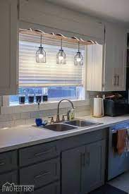 Amazing gallery of interior design and decorating ideas of flush mount light over kitchen sink in bathrooms, kitchens, entrances/foyers by elite interior designers. 17 Best Over Kitchen Sink Lighting Ideas Kitchen Sink Lighting Sink Lights Over Kitchen Sink