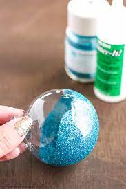 Making these glitter ornaments was pretty easy to do and once done, you can decorate them in so many ways. Diy Glitter Ornaments Best Glue To Use A Pumpkin And A Princess