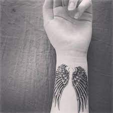 100 Angel Tattoo Ideas For Men And Women The Body Is A Canvas Wing Tattoo Designs Tattoos Sleeve Tattoos For Women