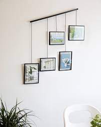 Whether it's along your staircase, in gallery walls or photo walls have become quite popular over the last few years. Exhibit Picture Frame Set Shop Modern Gallery Picture Frames Umbra