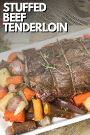 Creative meat dishes for a romantic date. Dinner Party Worthy Stuffed Beef Tenderloin With Roasted Vegetables