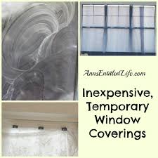Linen avenue custom cordless cassette 5% solar roller shade,black, charcoal, and white. Inexpensive Temporary Window Coverings