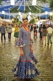 The dress skirt is made of ruffles that weight up to 4.5kg. How To Buy A Flamenco Dress For Sevilla S Feria De Abril Sincerely Spain
