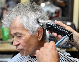 PICTURES: Jimmy's barbershop is creating a buzz downtown