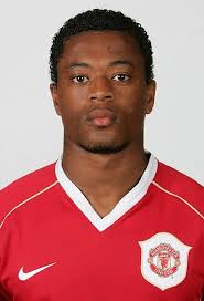 Patrice Evra of Manchester United poses during an official photocall...