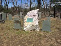 Grave of Ralph Waldo Emerson. Appropriately for his love of nature, it is  marked with an unsculpted rock. Next to him lie his 2nd wife, Lidian, &  daughter, Ellen. Sleepy Hollow Cemetery,